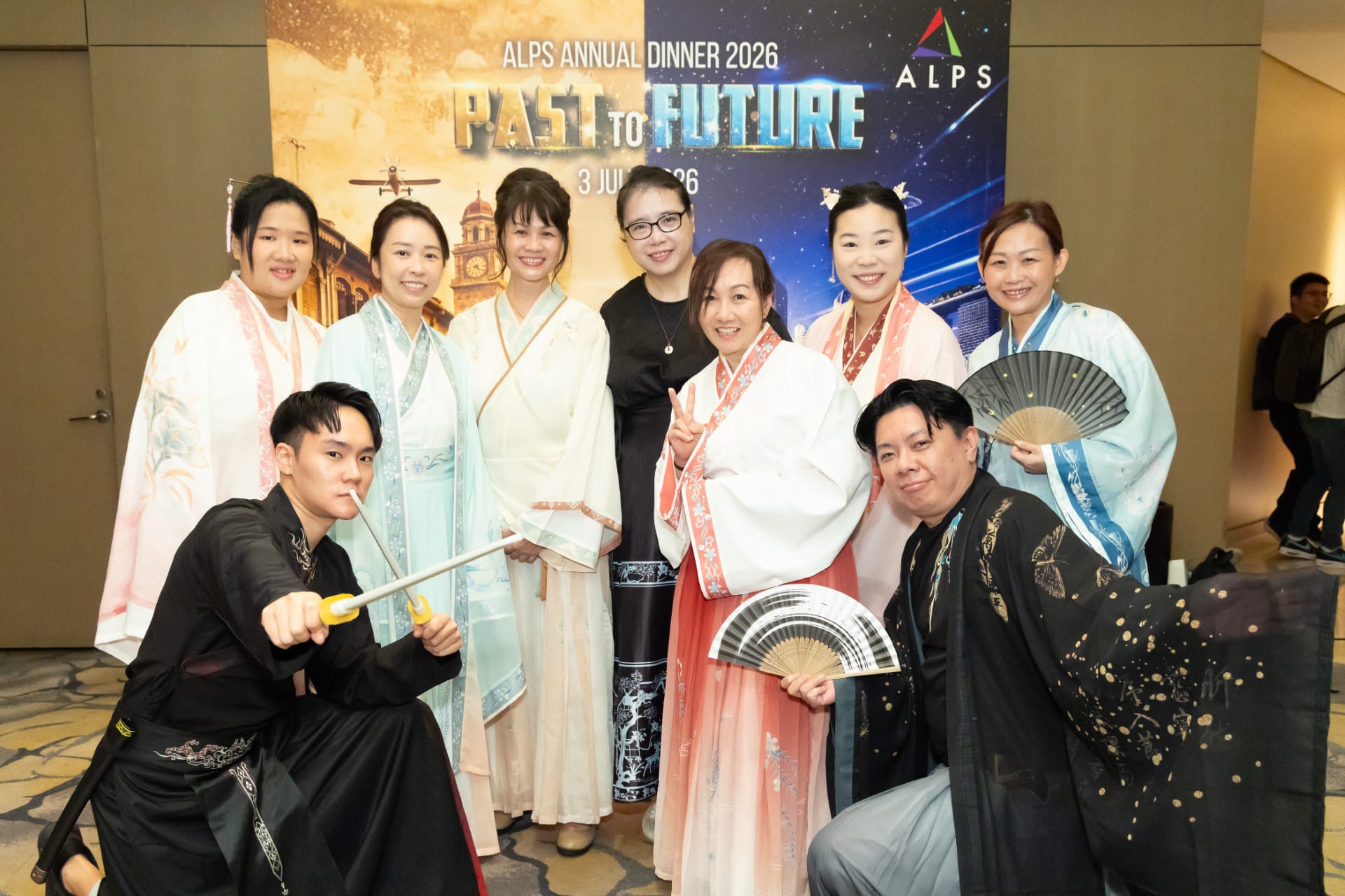 Photo of 9 ALPS staff taken at ALPS Anniversary Dinner